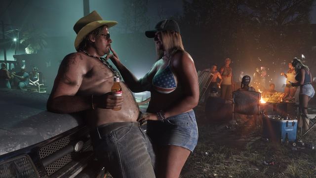 People gathered at a bonfire in Port Gellhorn. One couple is off to the side with the man leaning back on the hood of a truck and the woman putting her finger to his mouth while reaching for his belt.