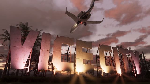 A jet flying over a sign that says Vice City.